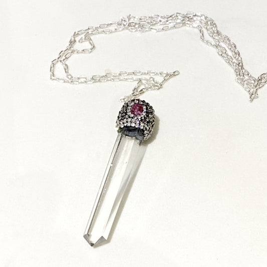 Long clear white crystal quartz cap-studded pendant on 30-inch silver-plated chain top view