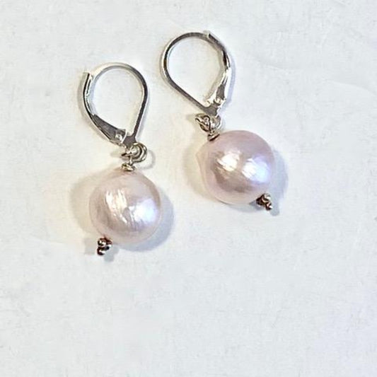 Pink 1/2" round flat-sided pearl earrings Sterling Silver Leverbacks Top View
