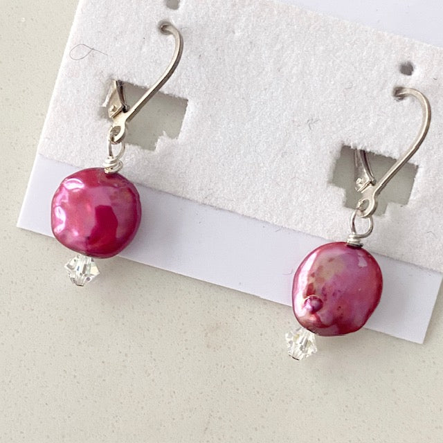 Dyed cranberry coin pearl lever-back earrings with clear Austrian crystal accents shown on jewellery earring card