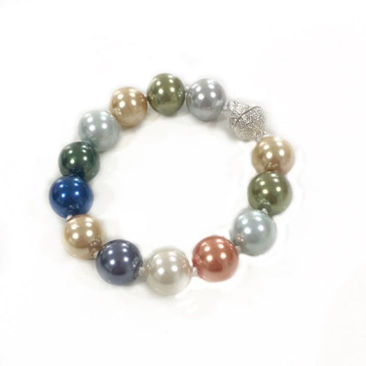 Knotted 7-inch shell  (faux) pearl bracelet with silver magnetic round clasp