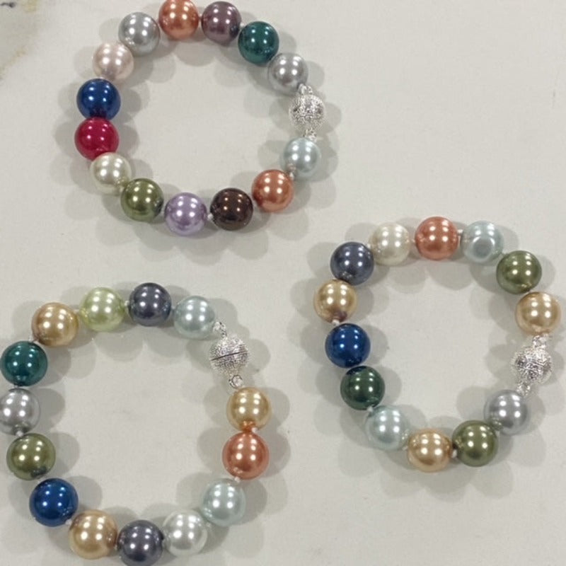 Multi-coloured shell pearl knotted bracelets top view