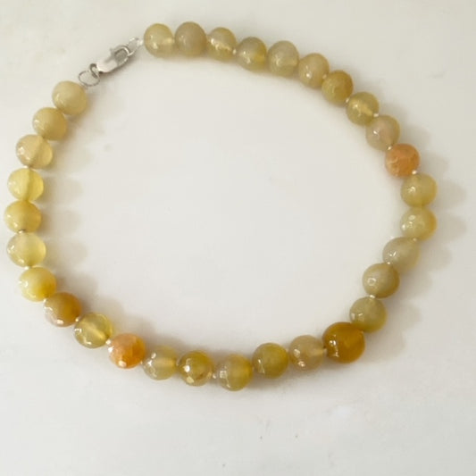 Hand-knotted 17-inch yellow agate choker necklace top view