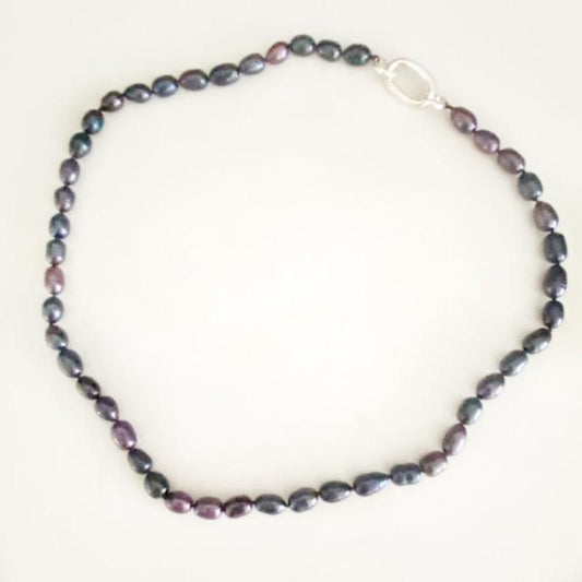 Inky black hand-knotted 20-1/2-inch pearl necklace with detachable sterling silver clasp  top view