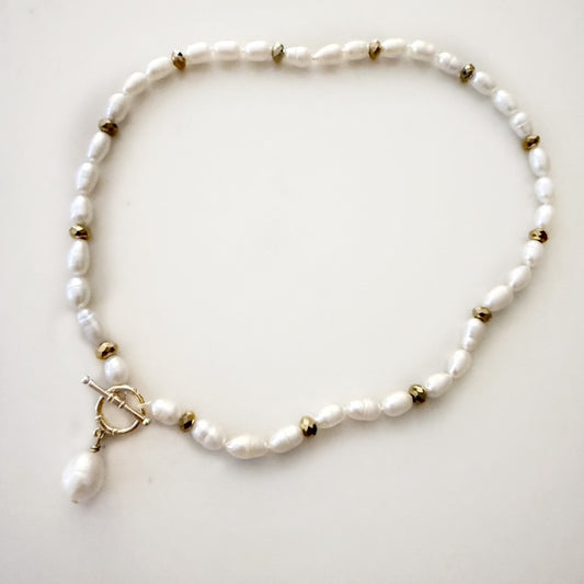 Knotted White Pearl Necklace with Gold Toggle Pearl Drop