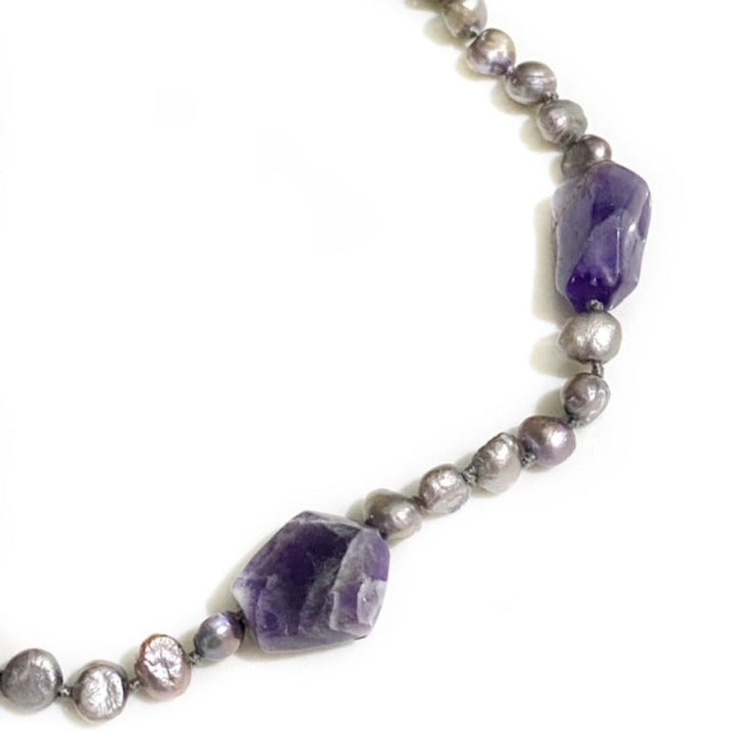 Another closeup view of the hand-knotted lavender pearls and chunky amethyst nugget beads