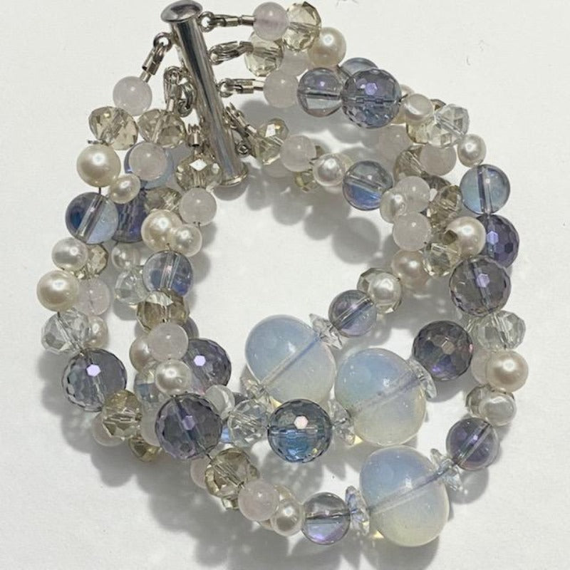 Beaded 5 strand Opalite Rose Quartz Pearl and crystal bracelet with magnetic sterling silver channel clasp top view