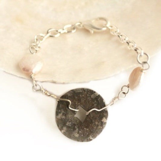 Authentic antique Chinese Coin and Coin Pearl wire-wrapped statement bracelet shown on shell prop