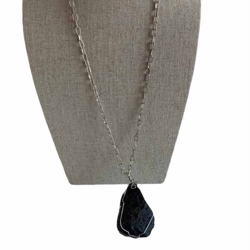 Chunky black Astrolite Wire-wrapped Teardrop Pendant Metal Chain on Linen Bust
