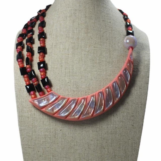 Coral Crescent Lucite Fantasy Necklace on Linen Bust