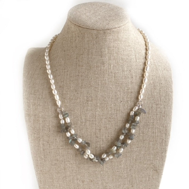 Double Segment 18-inch Pearls and  gray Labradorite chip beads suspended in the centre of the necklace shown on linen jewelry bust