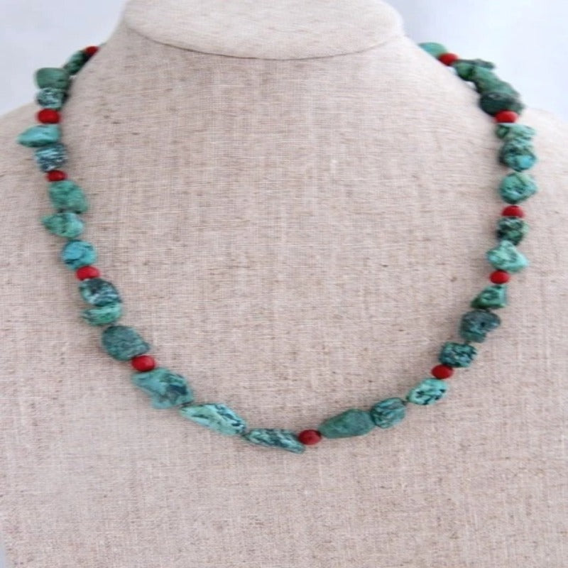 Front View Malachite Red Bead Necklace on Linen Bust