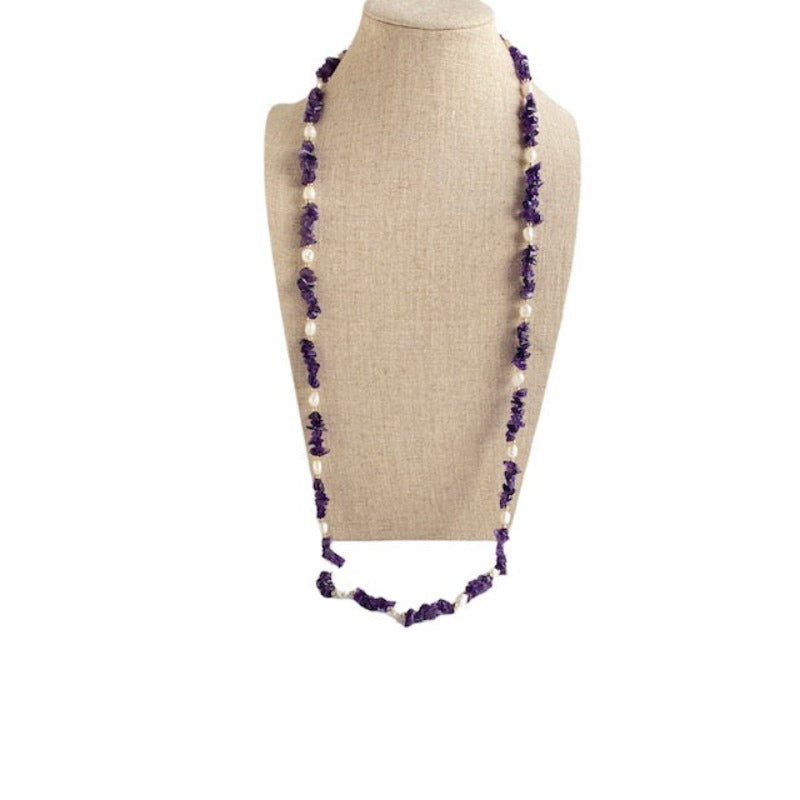 Long hand-knotted amethyst chip segmented necklace with white freshwater pearls 36 inches long shown on linen jewelry bust