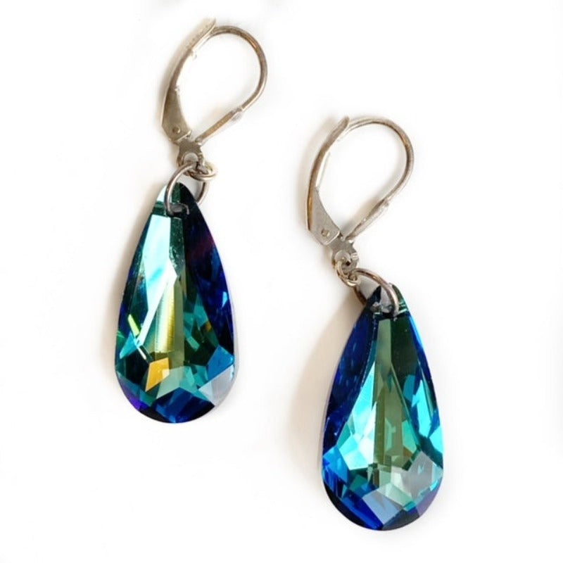 Long dangling sparkling blue Austrian crystal pear-shaped earrings Sterling lever-backs top view