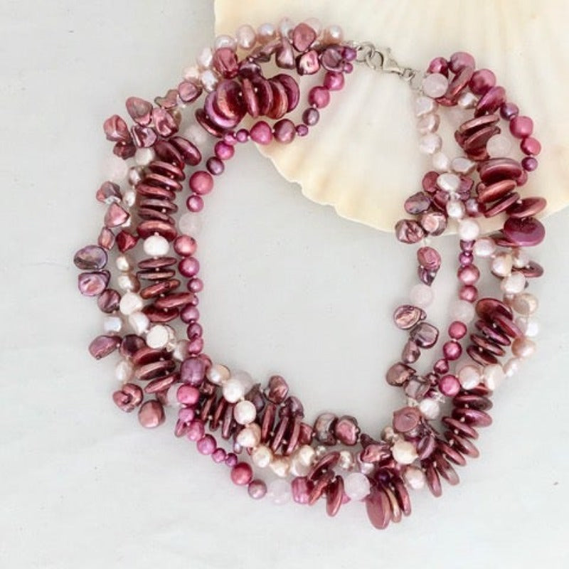 Multi-strand pink fuchsia hand-knotted pearl necklace with sterling silver lobster clasp