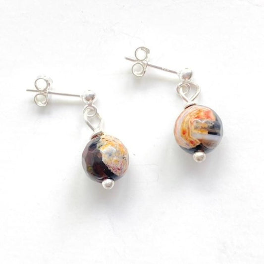 Orange-black Swirled Agate Sterling Stud style Earrings shown Top View 
