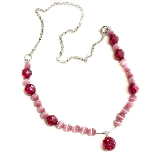 Pink hand-knotted Cat's-eye and facetted fuschia Bead Kinetic Motion necklace Top View