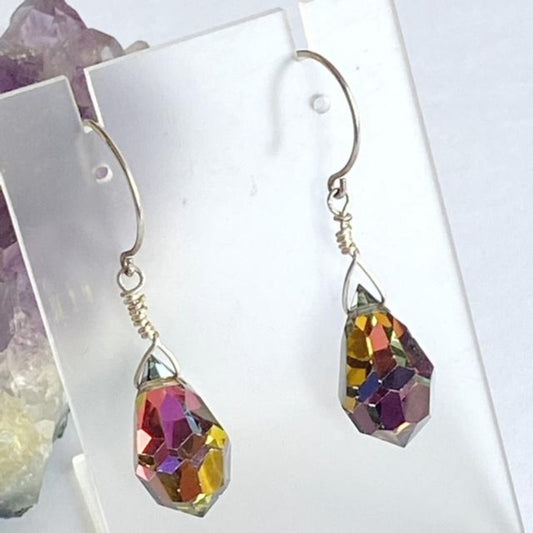 Rainbow teardrop facetted crystal earrings with sterling fish-hook ear wires on earring display