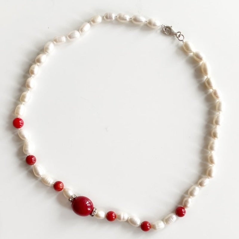Red lacquer beads and white freshwater pearl  knotted 18 inch necklace top view