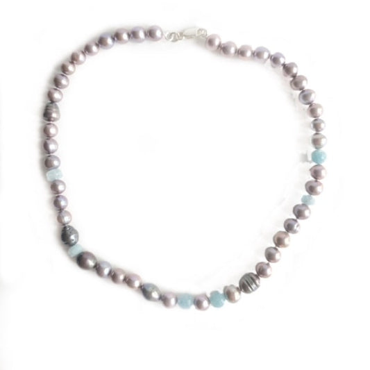 Single strand hand-knotted 18 1/2-inch lavender pearl and aquamarine bead necklace with sterling clasp top view