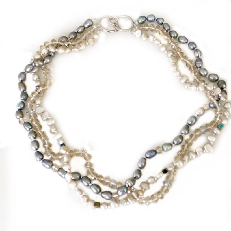 Triple Strand Pearl and Crystal knotted necklace top view with easy slip-together clasp