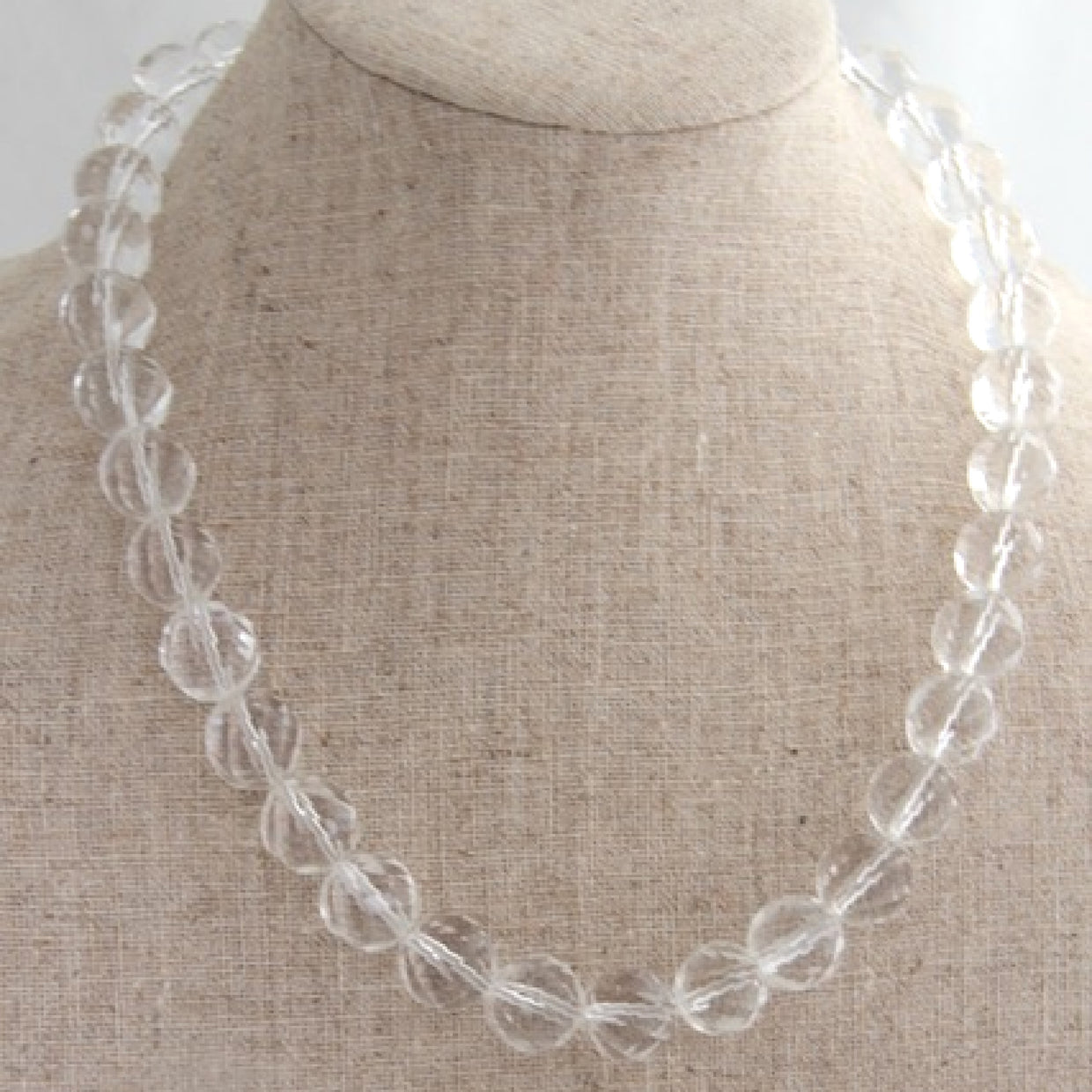 Clear White Facetted Beaded Choker Necklace on Linen Bust