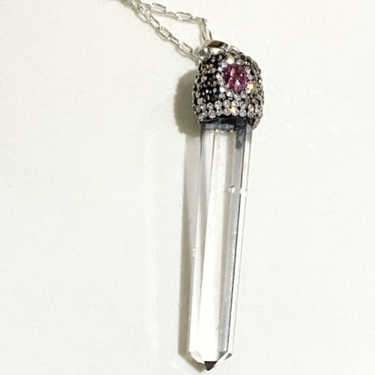 Long white  2-1/2-inch crystal spike pendant crystal-studded rhodium cap with purple gemstone on 30-inch fine silver-plated chain