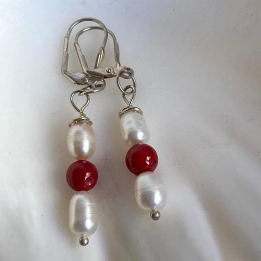 White pearl red lacquer bead 1 1/4" dangling earrings on silver-plated leverbacks Top view