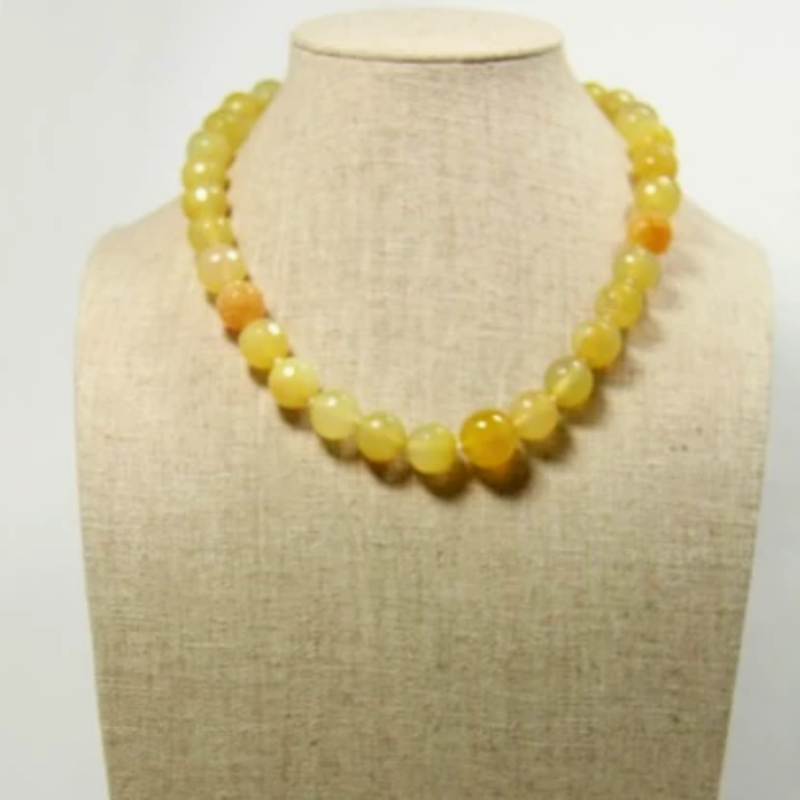Hand-knotted Yellow Agate 17 inch Choker Style Semiprecious Necklace front view on linen jewelry display stand